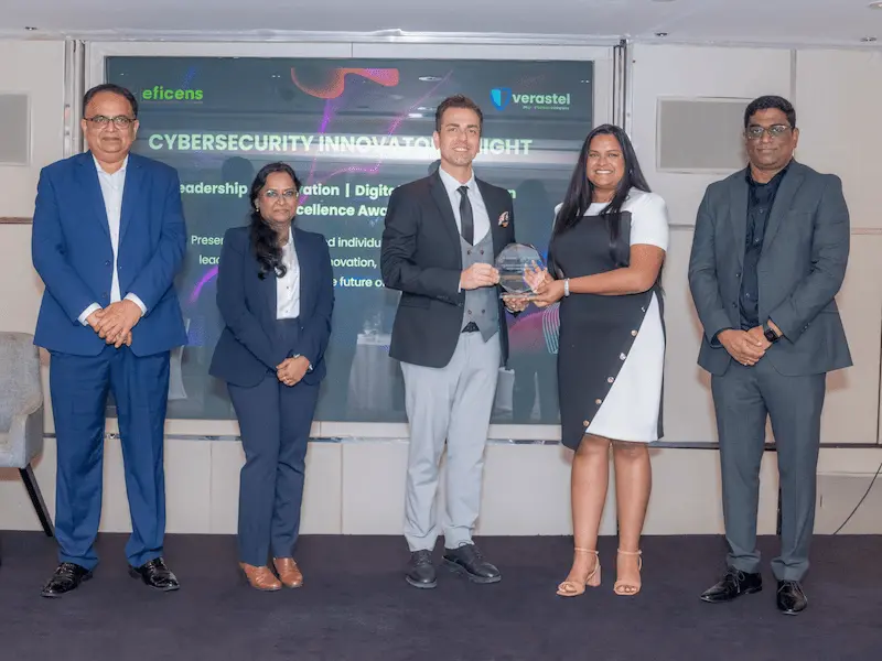 Alec Asgari receiving the Best Web Design Company 2026 award at Cybersecurity Innovators Night